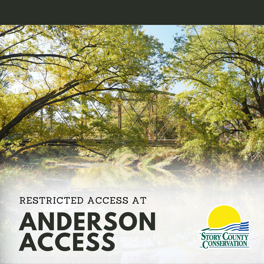 Bridge over Skunk River with green foliage and words Restricted access at Anderson Access