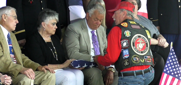 Photo of flag presentation to family of Ralph Bennett