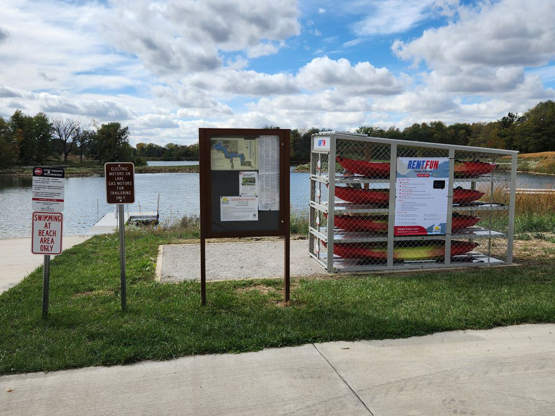 Kayak and paddle board rental kiosk at lake by beach2
