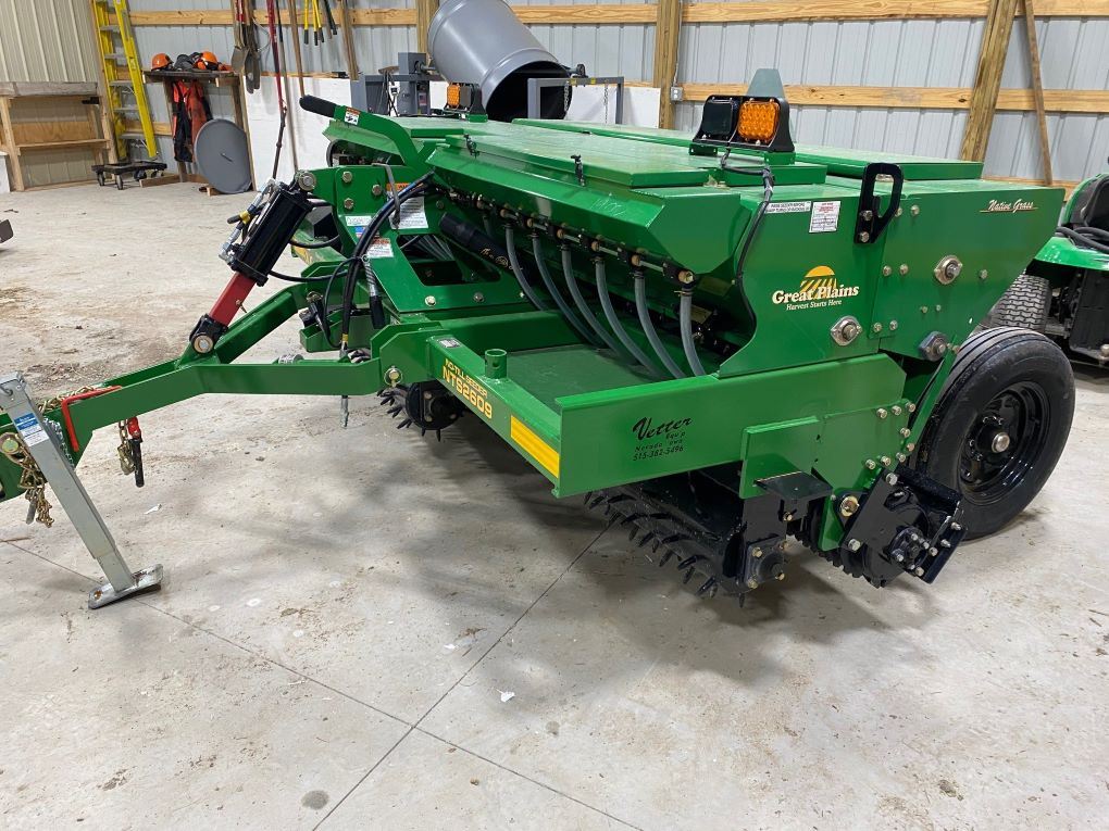 Green No-till drop seeder on concrete floor